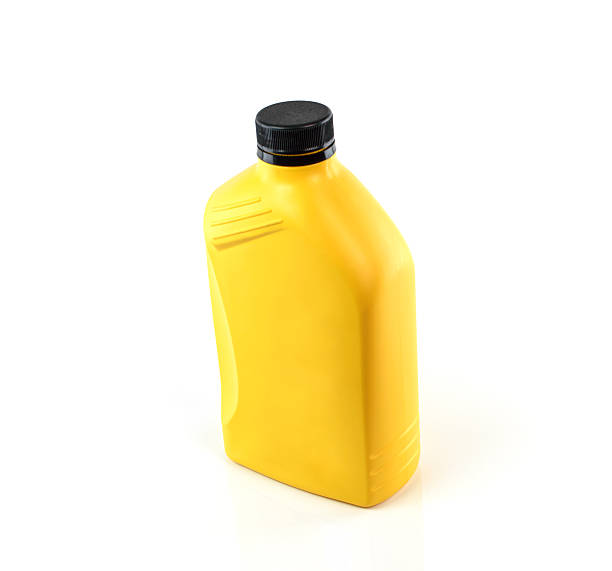 istock Lubricants , Motor oil bottle isolated on white background 528439085