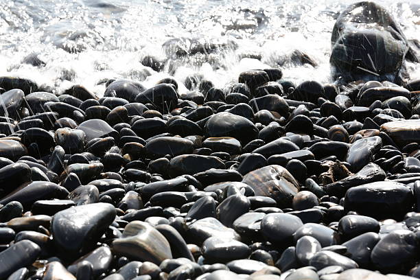 Pebbles on beach, Koh Hin Ngam, Satun, Thailand Pebbles on beach, Koh Hin Ngam, Andaman Sea, in Tarutao Marine National Park, Satun, ThailandStack of pebbles on beach, Koh Hin Ngam, Andaman Sea, in Tarutao Marine National Park, Satun, Thailand tarutao stock pictures, royalty-free photos & images