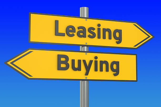 istock leasing or buying concept on the road signpost, 3D rendering 528439804