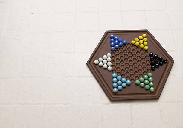 Chinese checkers set w/copy space Chinese Checkers set just waiting to be played with! (with copy space available) chinese checkers stock pictures, royalty-free photos & images