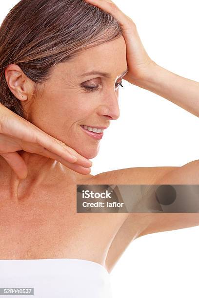 Her Skin Still Looks Amazing Stock Photo - Download Image Now - 40-49 Years, Beauty, Body Care