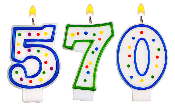 istock candles number five hundred seventy isolated on white background 528442101