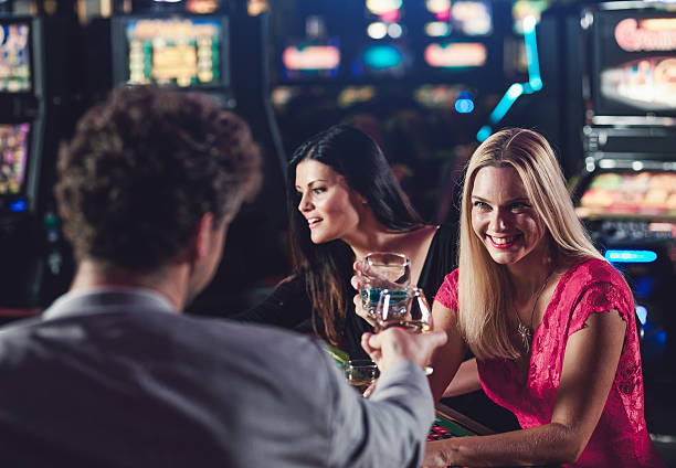 istock Friends playing roulette at the casino 528442284