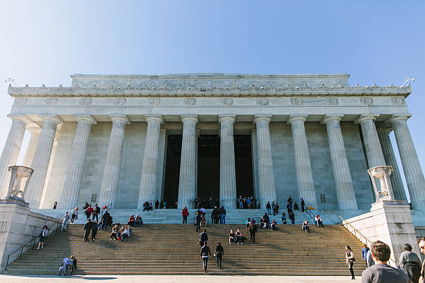 Tourists are visiting Lincoln memorial, Washington DC. Washington DC, USA - October 19, 2015: Tourists are visiting Lincoln memorial, Washington DC, USA. It's an American national monument built to honor the 16th President of the United States, Abraham Lincoln maryland us state photos stock pictures, royalty-free photos & images