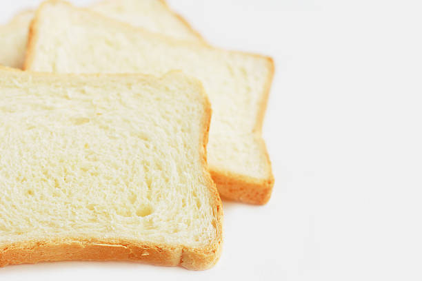 pão branco close-up - undernourishment imagens e fotografias de stock