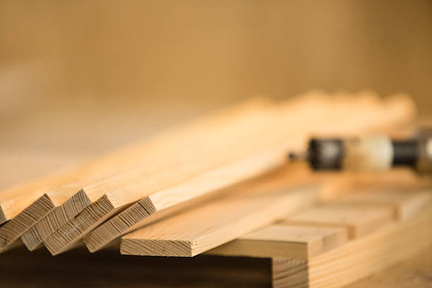 Wooden planks and power drill, close-up