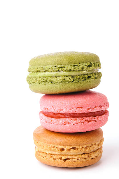 istock Tasty colorful macaroon bite on white background 528460979