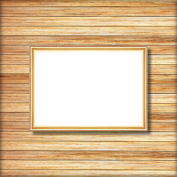 istock antique gold frame on wooden wall 528460987