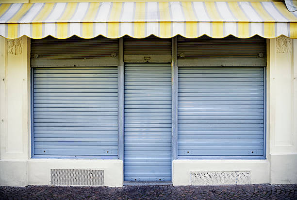 old store front old store front - nice facade shutter door stock pictures, royalty-free photos & images