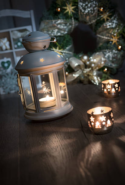 istock Decorative lantern, candles and Christmas decoratons on wood, te 528467003