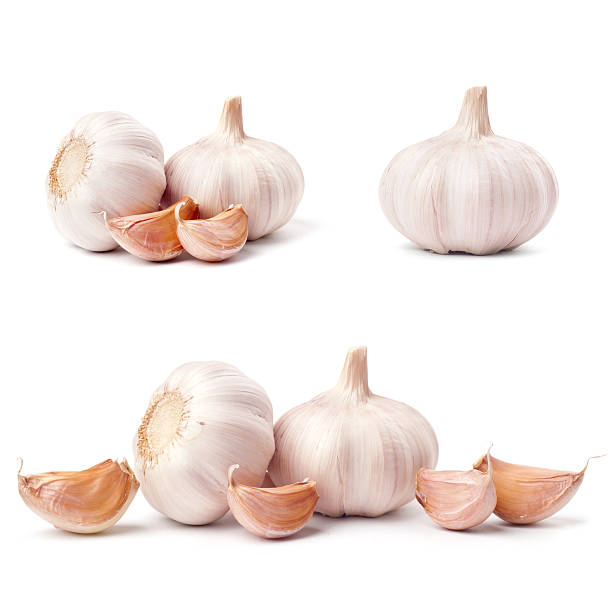 ニンニクセットに分離白背景 - garlic clove isolated white ストックフォトと画像
