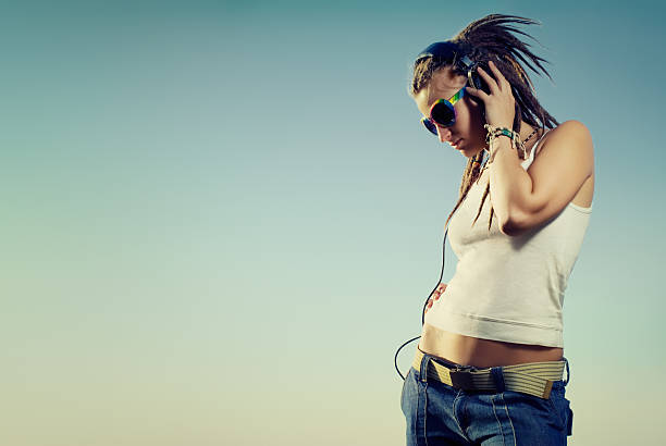 istock girl with headphones 528467413