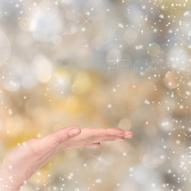 istock Woman hand on Christmas background 528467631