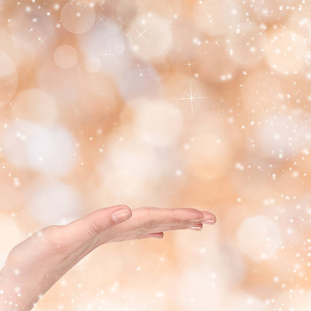 istock Woman hand on Christmas background 528467643