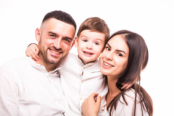 istock happy family: mother, father and son on white background 528475604