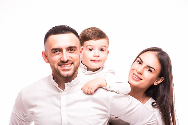 istock happy family: mother, father and son on white background 528475696