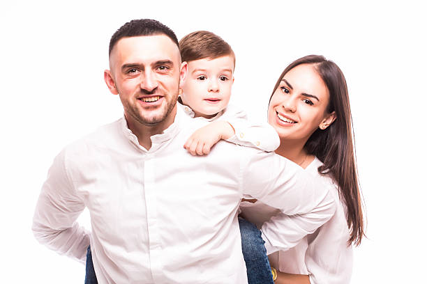 istock happy family: mother, father and son on white background 528475736