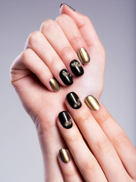 istock Beautiful woman's nails with beautiful creative manicure 528476114