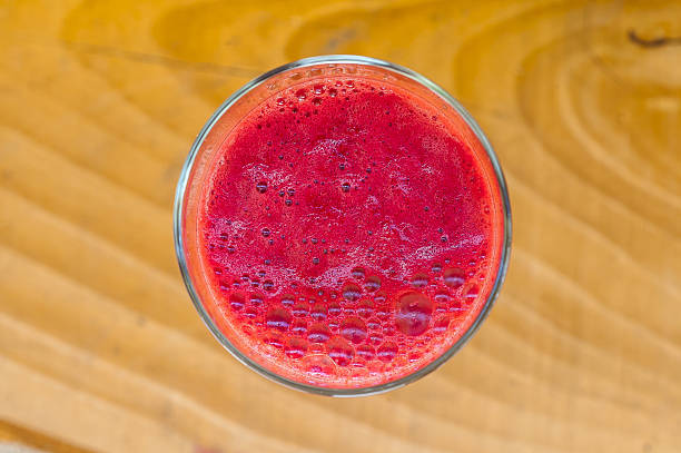 istock Beetroot juice and bunch of fresh beetroots 528476178