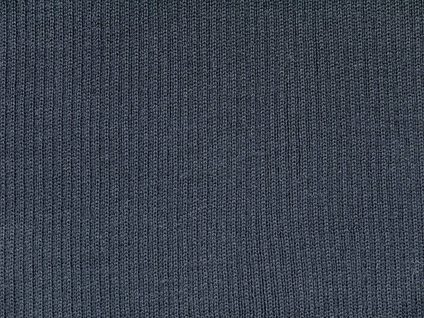 istock Dark gray finely ribbed knitted wool fabric 528476268