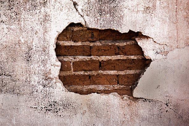 istock Brick,concrete weathered grunge wall background 528476570