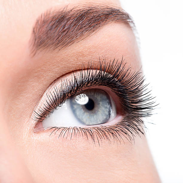 istock Beauty female eye with curl long false eyelashes 528476970