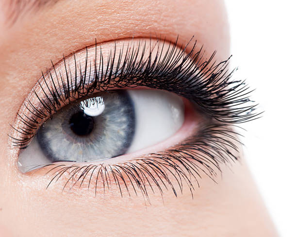 istock Beauty female eye with curl long false eyelashes 528477154