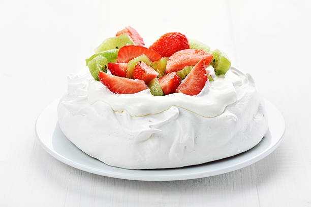 istock Meringue cake with strawberries and kiwi 528478606
