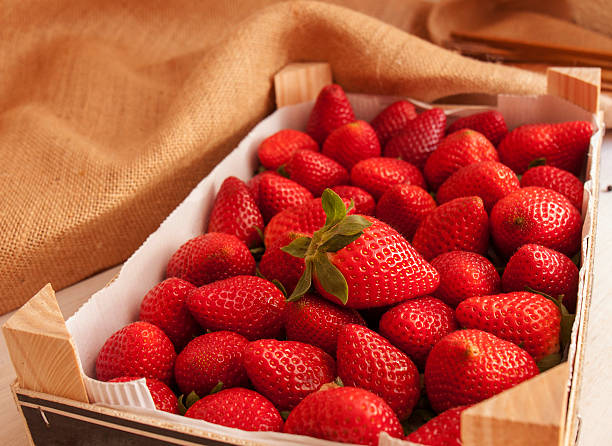 fresh strawberries in a wooden box