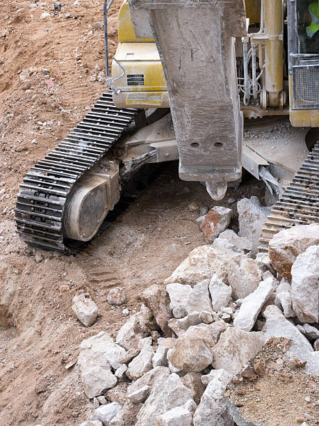 Máquina escavadora com martelo Plano aproximado - fotografia de stock