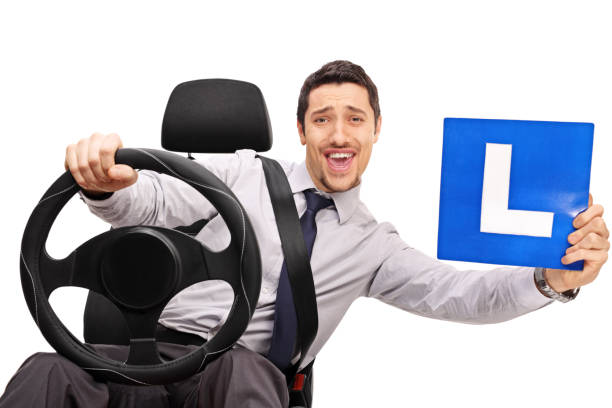 istock Confident young driver holding an L sign 528480536