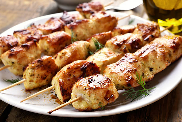 istock Grilled chicken on bamboo skewers 528480786