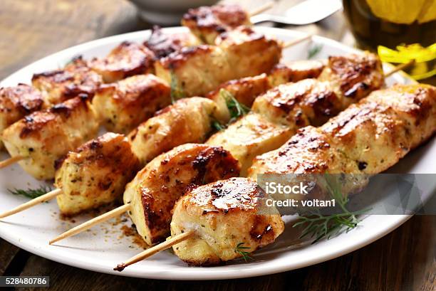Grilled Chicken On Bamboo Skewers Stock Photo - Download Image Now - Appetizer, Baked, Barbecue - Meal