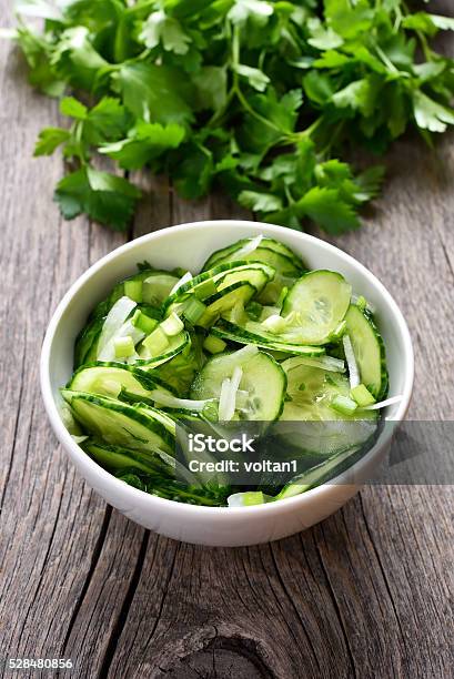 Cucumber Salad On Wooden Background Stock Photo - Download Image Now - Appetizer, Bowl, Close-up
