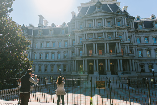 Washington DC, USA - October 19, 2015: A view of the Eisenhower Executive Office Building historical building in Washington DC. Backlight, lens flare.