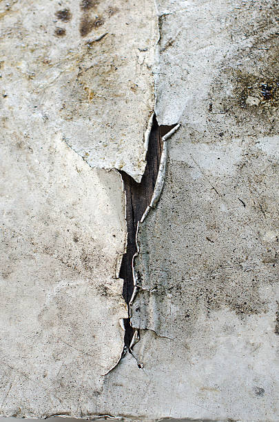 Cracked and peeled metal with rust texture.