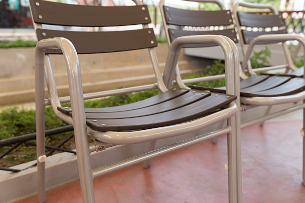 istock brown plastic chair in the park 528488346