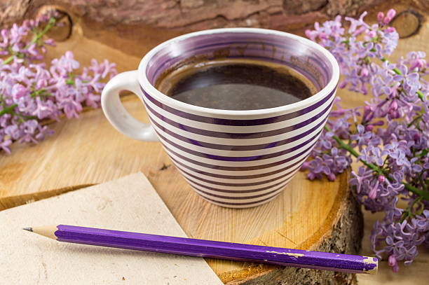 istock Cup of coffee and spring flowers 528490774