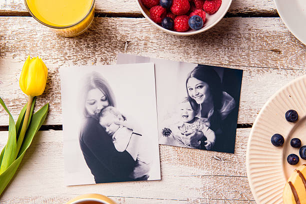 istock Mothers day composition. Black-and-white pictures and breakfast 528491486