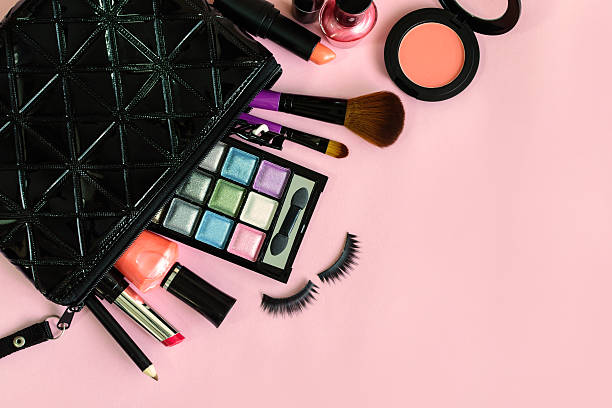 istock make up with cosmetics and brushes isolated on pink background 528491926