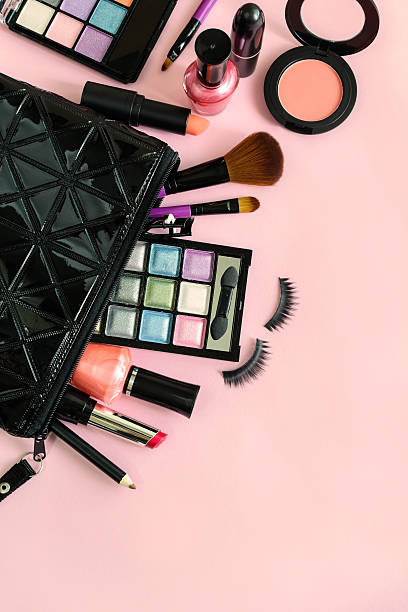 istock make up with cosmetics and brushes isolated on pink background 528492028