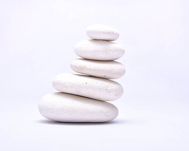 istock pile of stones isolated on white background 528493375