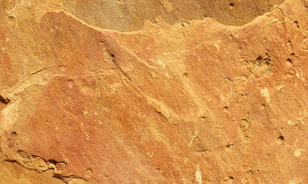 istock detail of an old orange sandstone surface 528495172
