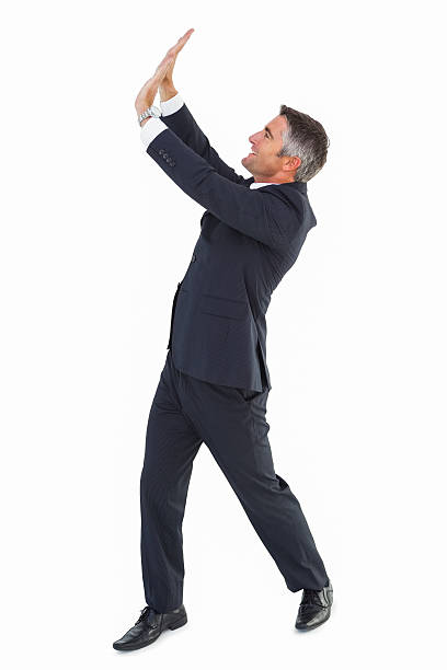 istock Happy businessman with his arms up 528495245