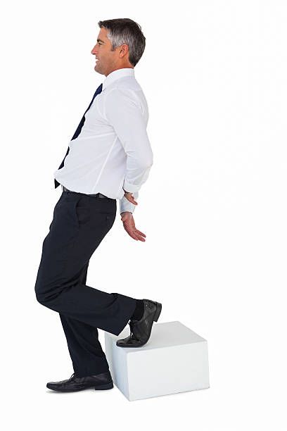 istock Businessman with hands behind his back 528495441