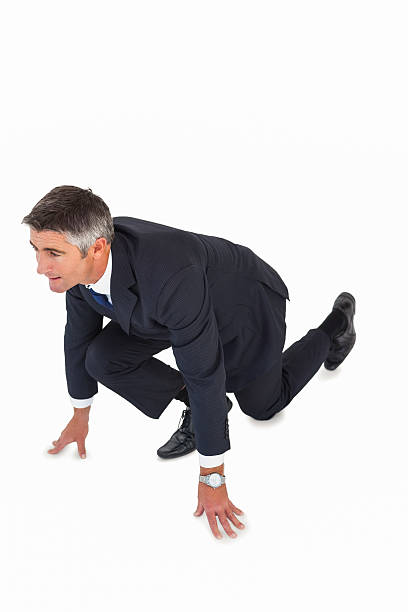 istock Businessman with hands and one knee on the floor 528495521