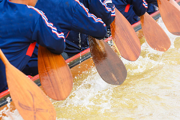 Close up of rowing team race stock photo