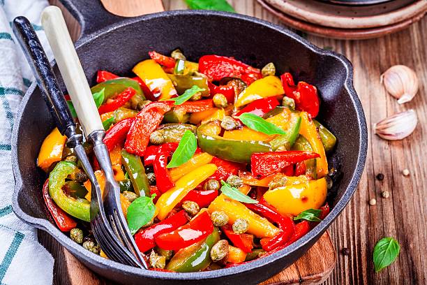 istock Italian cuisine, peperonata: roasted bell pepper with capers and basil 528496092