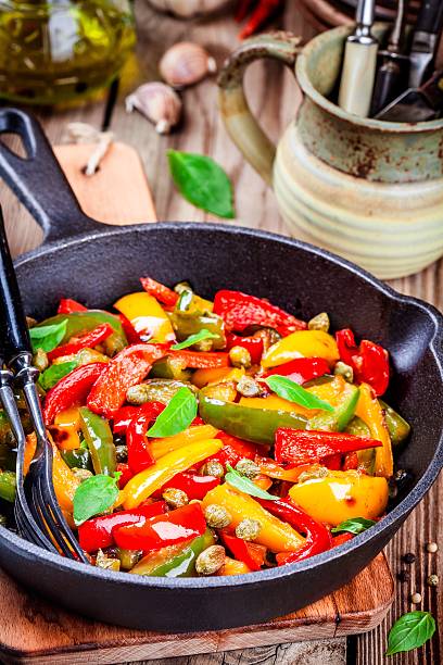 istock Italian cuisine, peperonata: roasted bell pepper with capers and basil 528496136