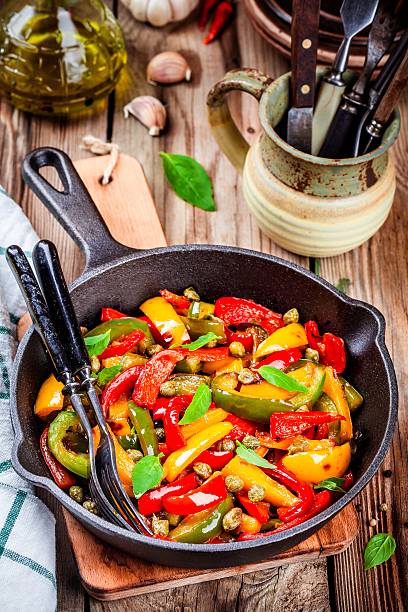 istock Italian cuisine, peperonata: roasted bell pepper with capers and basil 528496188